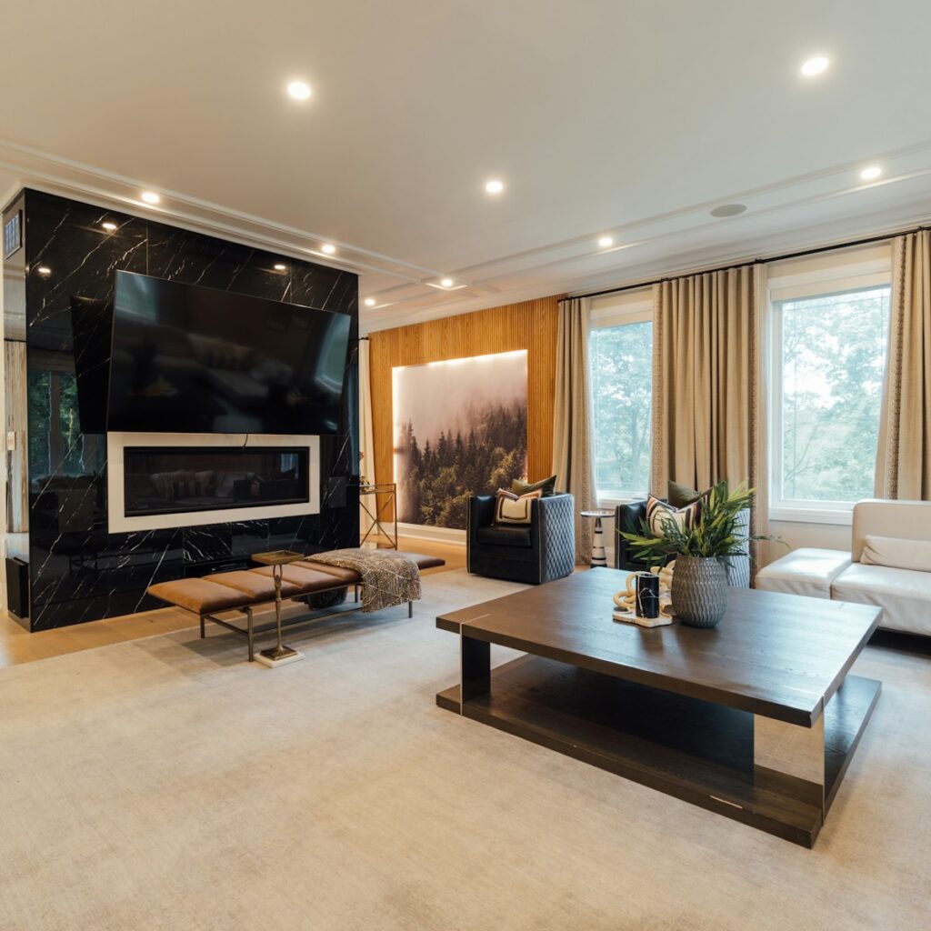 Elegant living room with fireplace feature wall and marble finishes
